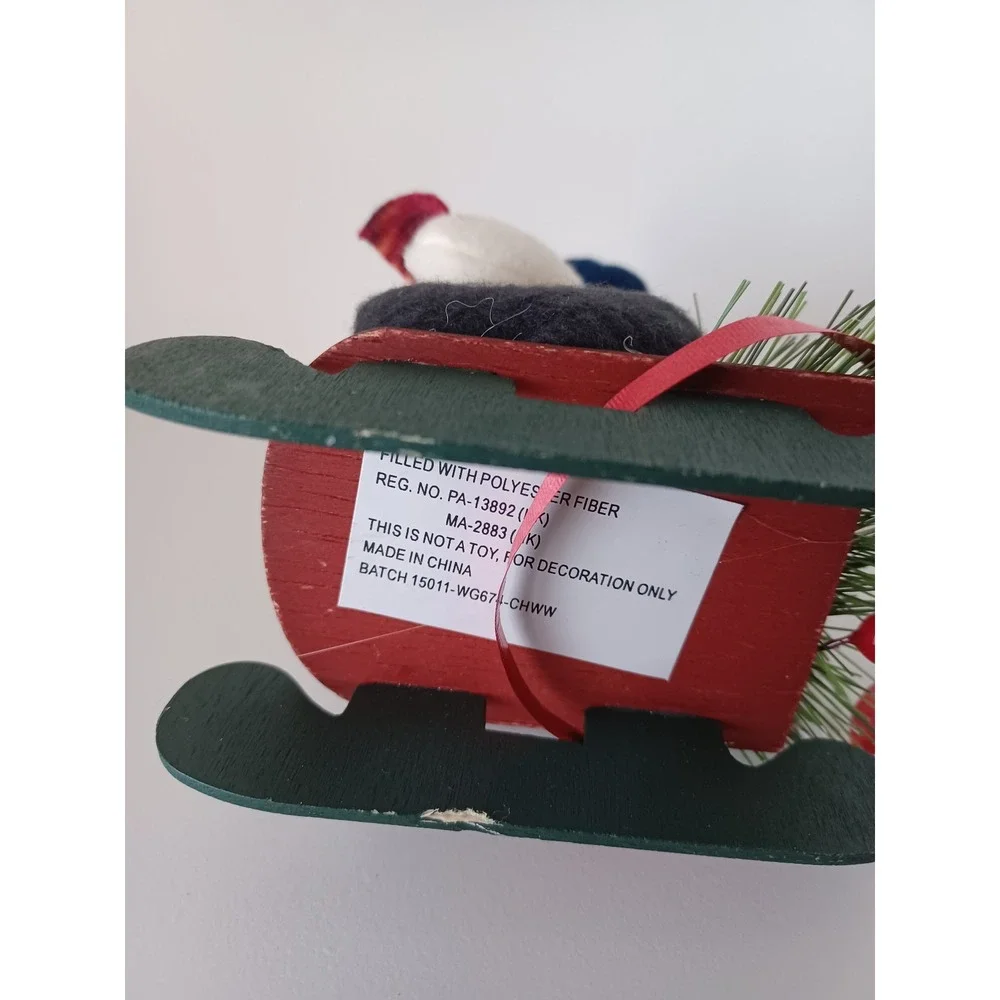Vintage Snowman Holiday Seasonal Christmas On Sled Ornament Collectible